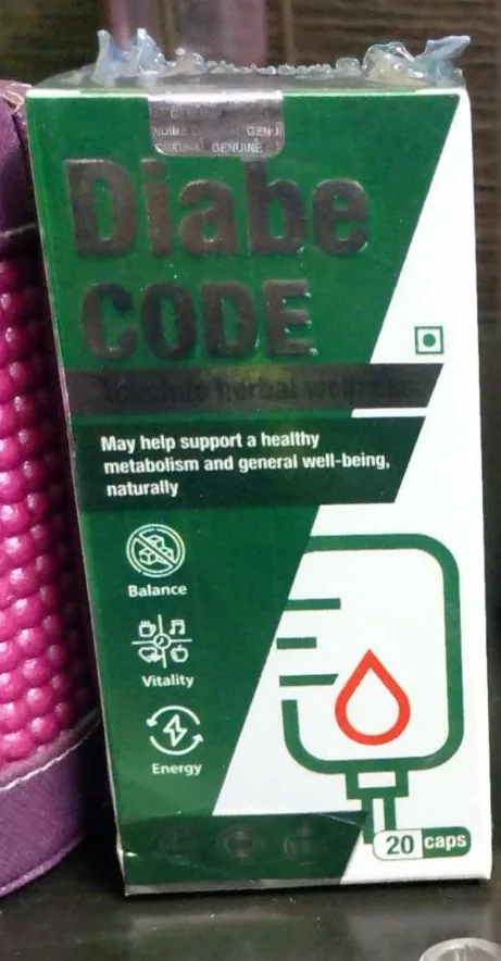 DiabeCode box next to a laptop