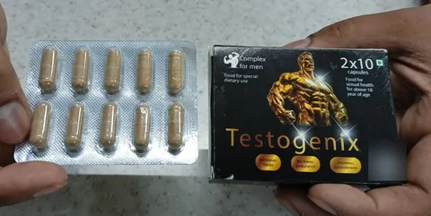 Testogenix blister strip and box held in two hands