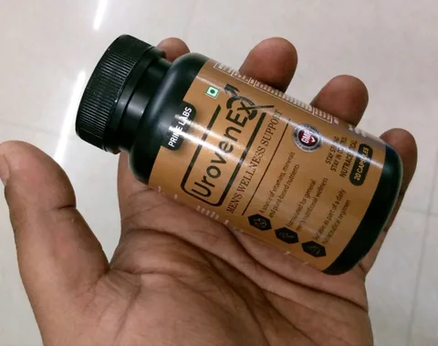 UrovenEx bottle held in the palm of a hand